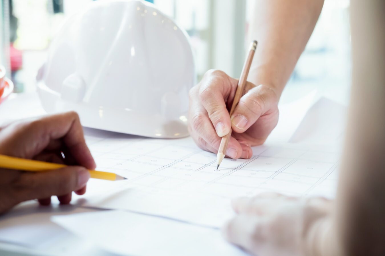 engineer-meeting-architectural-project-working-with-partner